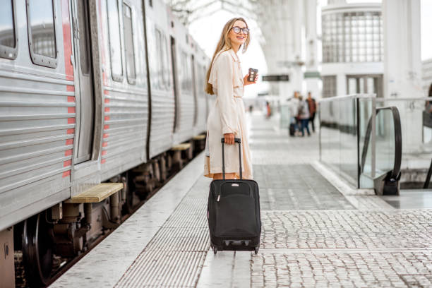 istock Woman at the railway station 873469084