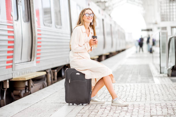 istock Woman at the railway station 873469142