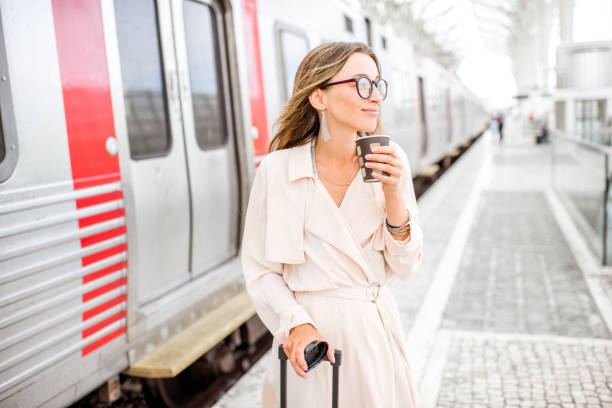 istock Woman at the railway station 873469164