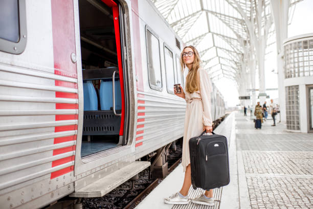 istock Woman at the railway station 873469734