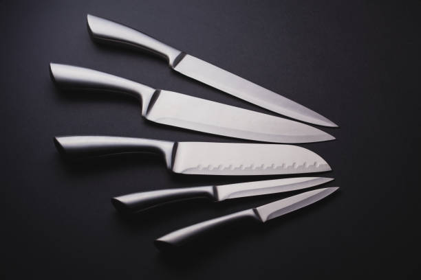istock steel kitchen knives on the black 873472876