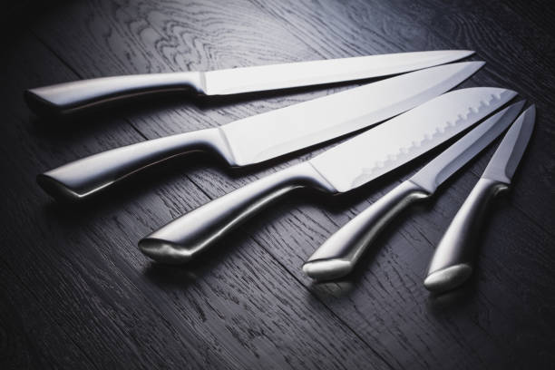 istock steel kitchen knives on the black 873472956