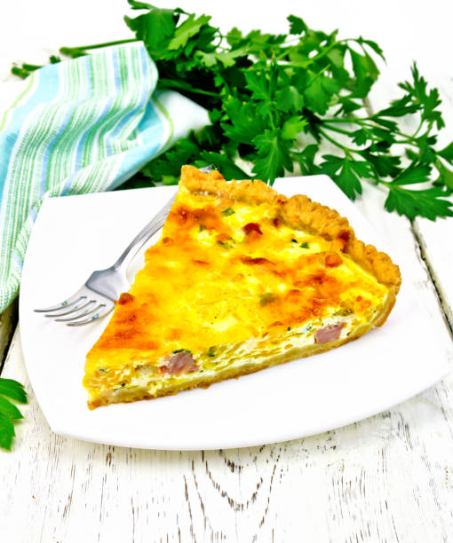 istock Quiche with pumpkin and bacon in white plate on board 873477664