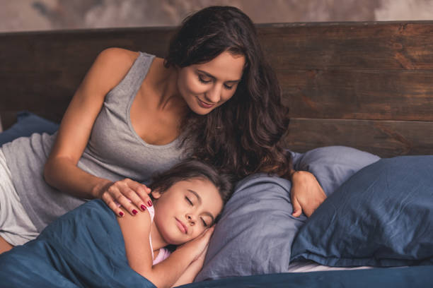 istock Mom and daughter at home 873484680