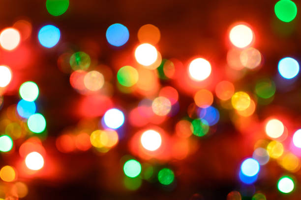 istock Multicolored highlights, background from a garland without focus 873491728