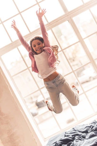 istock Little girl at home 873491948