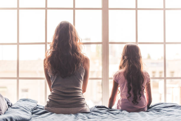istock Mom and daughter at home 873492764