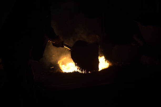 istock melting waste iron in the crucible 873499210