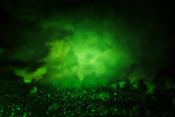 istock Green glitter vintage lights background. de-focused. 873507752
