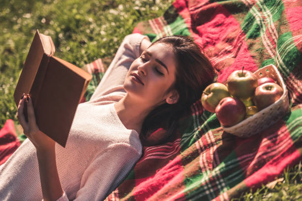 istock Woman in the park 873507890