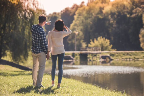 istock Couple in the park 873508184
