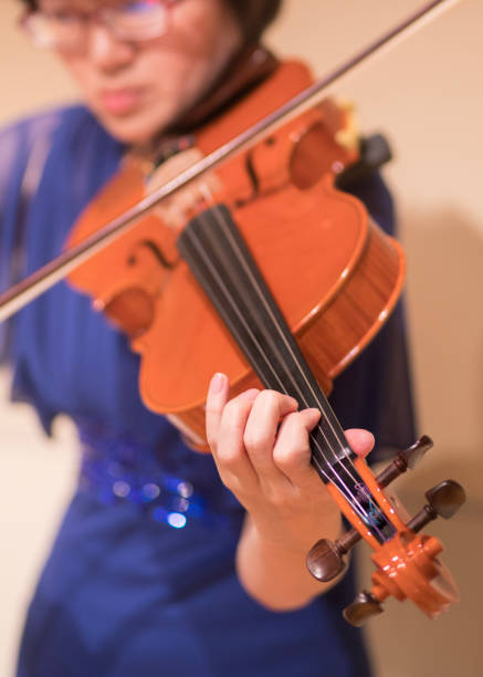 Woman playing viola on concert