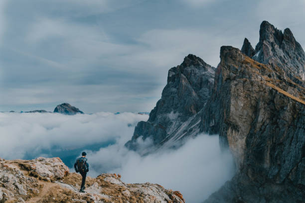 istock Man hiking near Seceda mountain in Dolomites 873511496