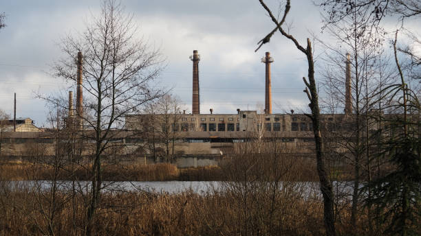 istock Abandoned factory on the river 873515560