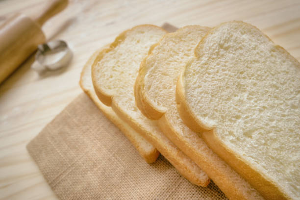 Morning bread, Healthy Cooking Methods, Bread on hemp sack in kitchen, copy space,breakfast,Process of bread making occurs, Nutritional Benefits of Bread, health bun.