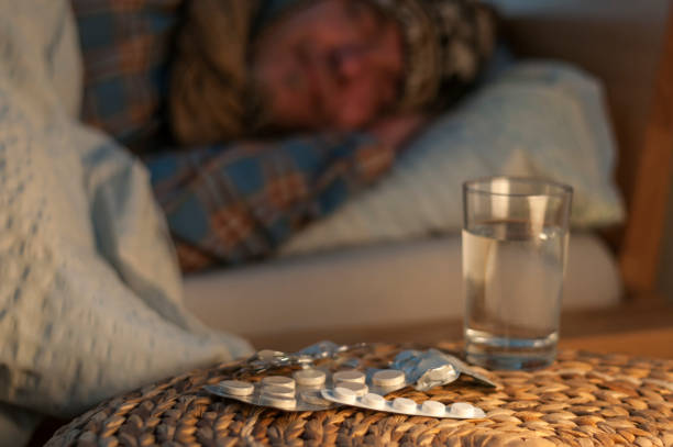 istock A man lie with cold in your bed 873527494