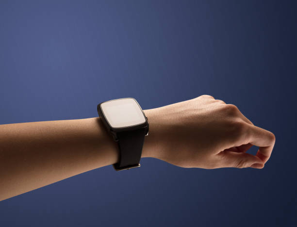 istock Close up female hand with balck smartwatch screen 873528038