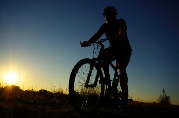 istock Male cyclist driving outdoors 873528712
