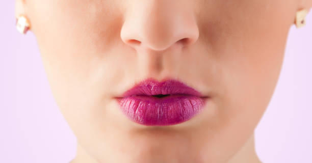 istock Beautiful woman red lips close up 873531356