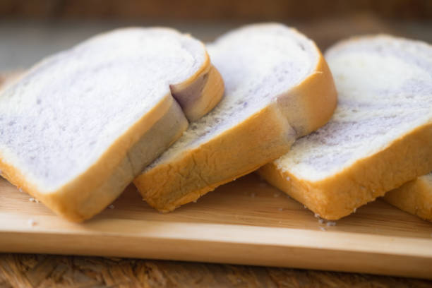istock Taro sliced bread on wood tray (close up) 873531772