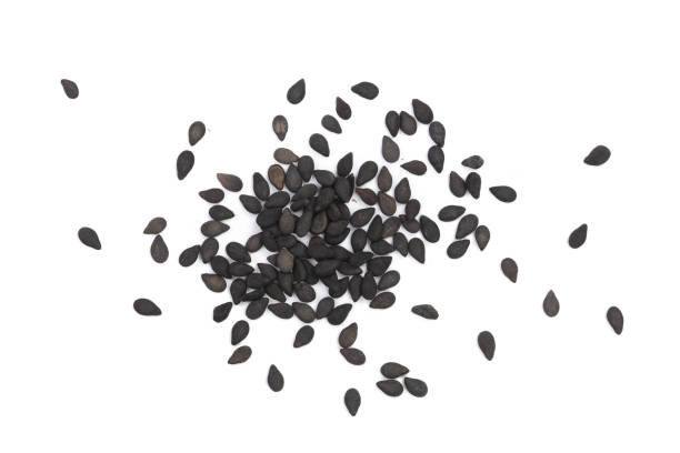 istock Black sesame seeds isolated on white background top view 873531882