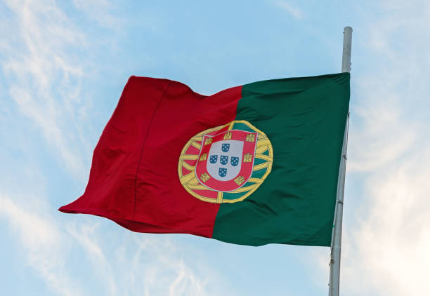istock Portuguese flag waving in the wind. 873534544