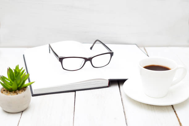 istock Book for study and glasses on a white background. Education concept 873535236