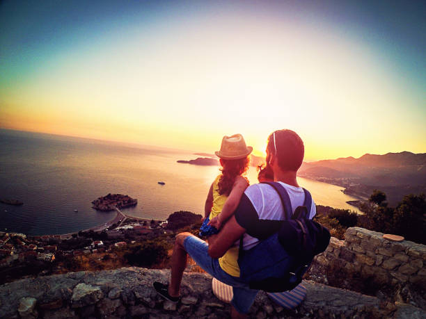 istock Father with two daughters enjoy in sunset, father and daughter connection 873546432