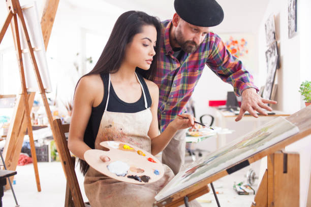 istock Student and teacher working in atelier 873548492