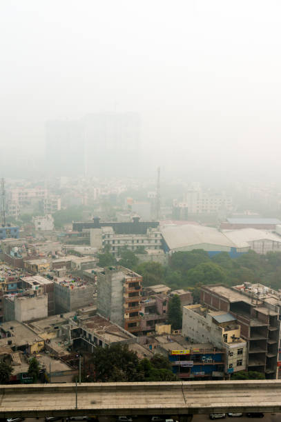 istock Smog fog covered noida cityscape at dawn 873550874