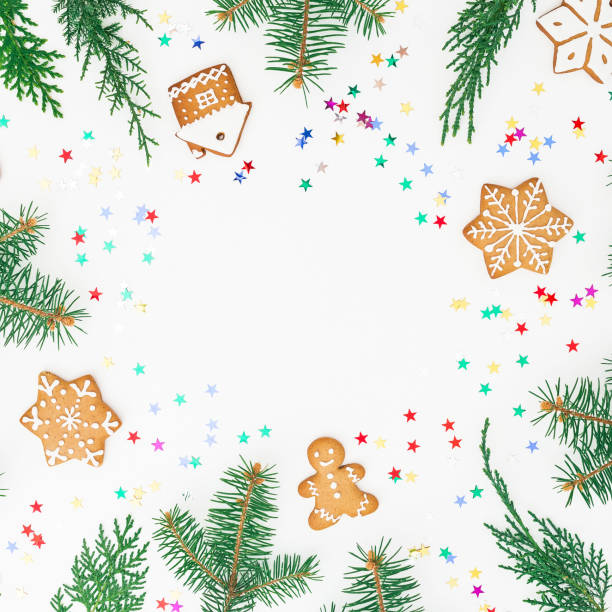 istock Round made of gingerbread, winter tree and confetti on white background. Flat lay. top view. Christmas or New year concept 873551424