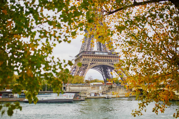 istock Scenic view to the Eiffel tower on a fall day 873551460