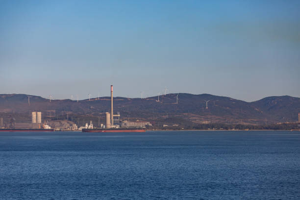 istock Windmills and Industry on Coast of Gibralter 873555210