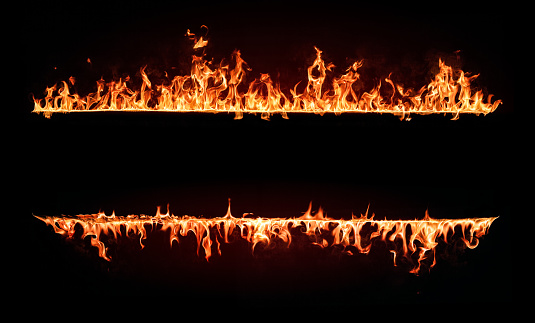 Marco de llamas de fuego. Elemento de diseño aislado sobre fondo negro photo