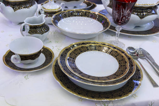 istock Luxury linens on the holiday table. Dishes 873560692