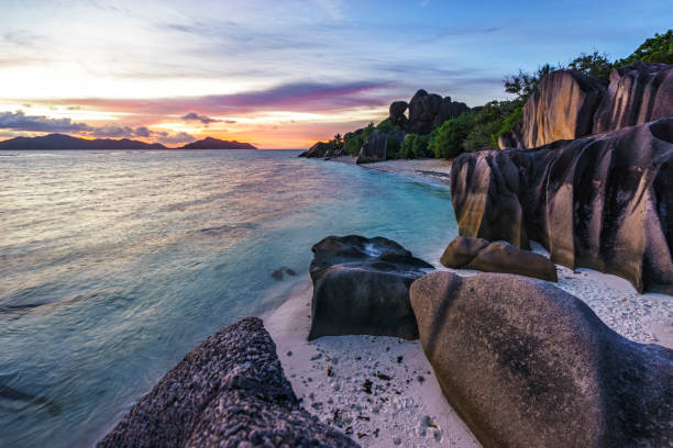 istock romantic sunset in paradise, silver spring cove, the dike, seychelles 16 873563252
