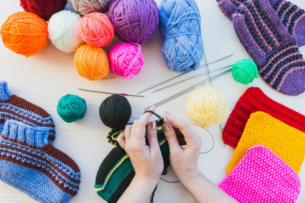 istock girl knits sock knitting needles 873563508