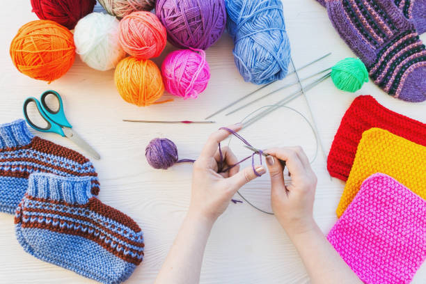 istock girl knits sock knitting needles 873563516