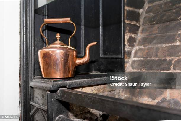 Vintage And Antique Copper Kettle On A Victorian Stove In A Traditional Victorian Kitchen In England United Kingdom Stock Photo - Download Image Now