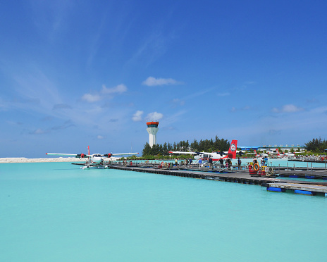 Male: Tourists preparing to get on a seaplane at Male seaplane terminal. They will then be taken to their choices of island resorts among other thousands islands in atolls