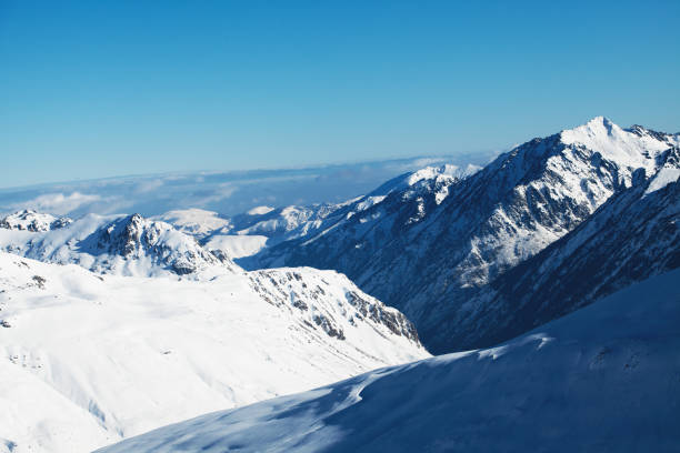 istock Winter mountains on a bright sunny day 873570700
