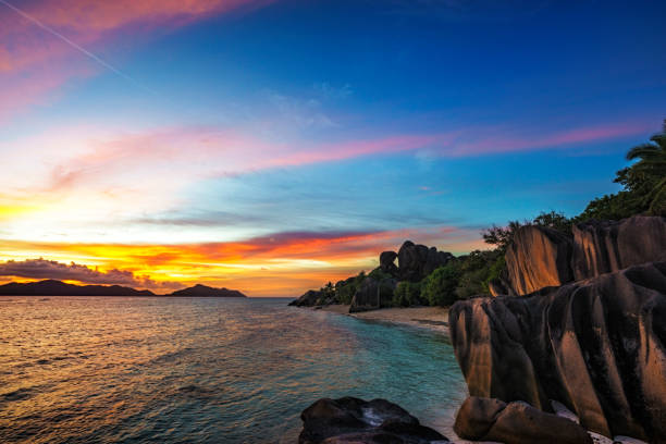 istock romantic sunset in paradise, silver spring cove, the dike, seychelles 10 873570980