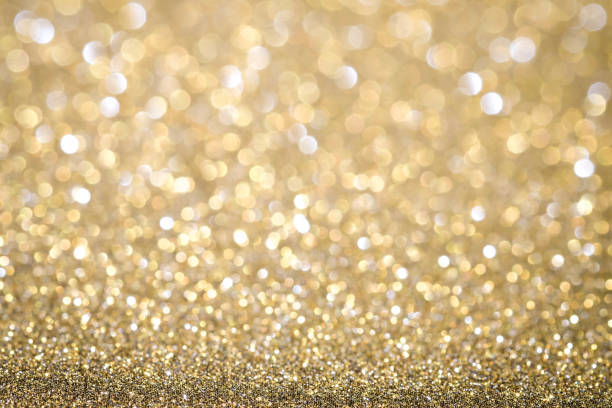 istock Gold Abstract Christmas twinkled bright background with bokeh defocused lights . Lights Festive background concept. 873571432