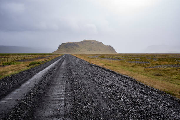 istock Black road on the foothills 873577506