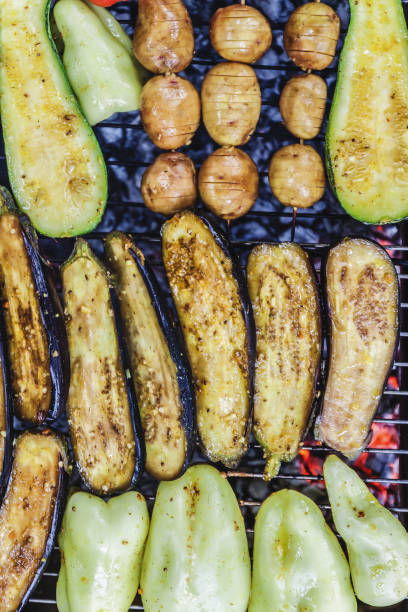 istock Assorted grilled vegetables.Chef cooking vegetables.top view close up 873587166