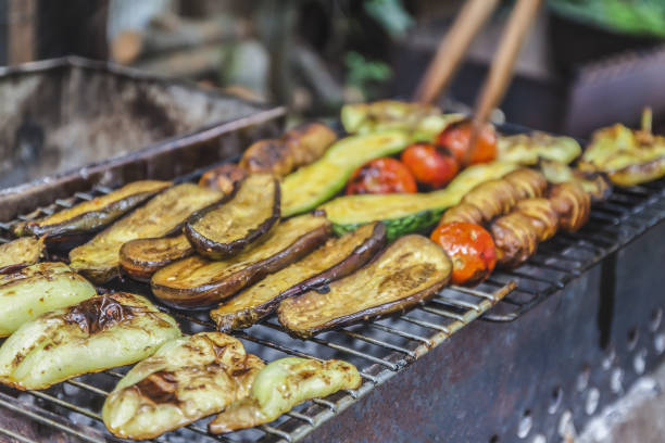 istock Assorted grilled vegetables.Chef cooking vegetables.top view close up 873587172