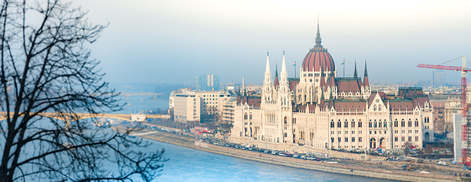 Parliament building in Budapest, Hungary, Europe. Blue water of Danube river. Major Landmark and tourist attraction.