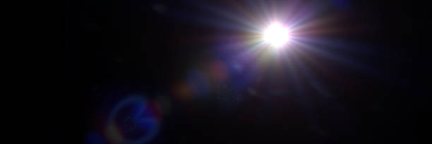 istock bluish lens flare effect overlay texture banner with light streak and bokeh effect in front of a black background 873594176