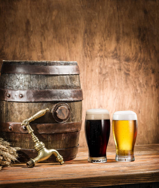 istock Glasses of  beer and ale barrel. 873594434