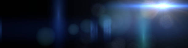 istock very bright blue lens flare effect overlay texture banner with light streak and bokeh effect in front of a dark blue background 873594468